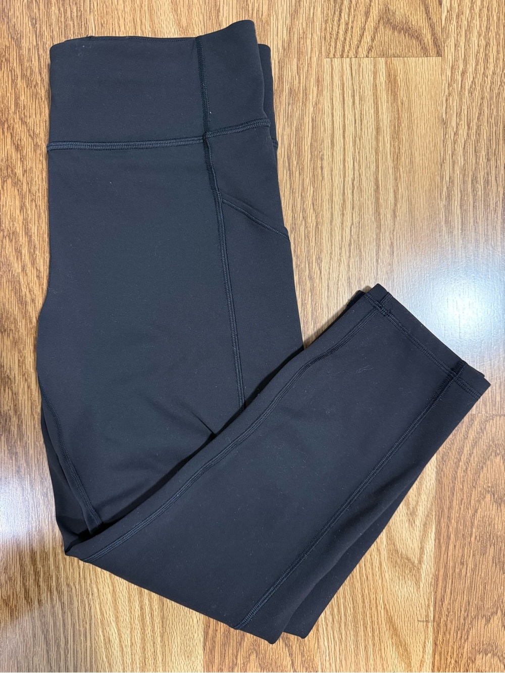 Lululemon black Nulux 23" Cropped Leggings w/ pockets size 10